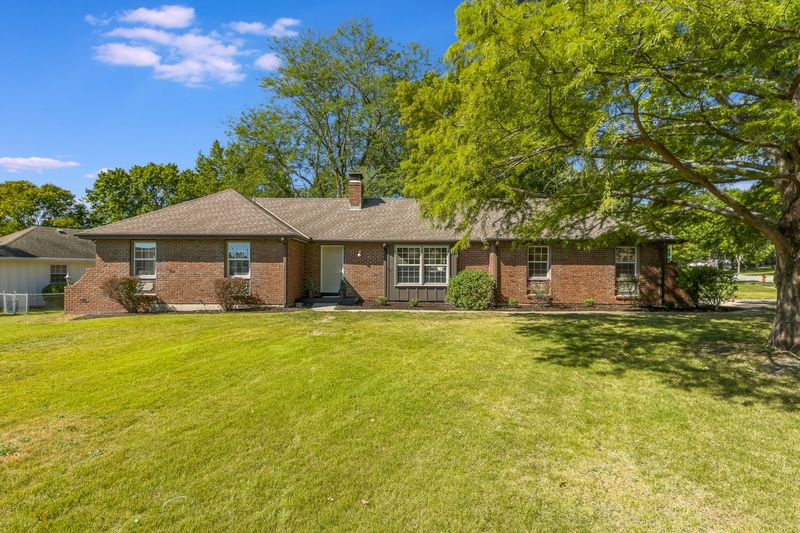 Front exterior of 10900 Lydia Ave, Kansas City, MO, a home sold by Carol Tran Reynolds