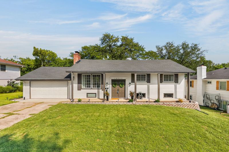 Front exterior of 10923 Myrtle Ave, Kansas City, MO, a home sold by Carol Tran Reynolds