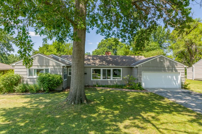 Front exterior of 614 E 107th Ter, Kansas City, MO, a home sold by Carol Tran Reynolds