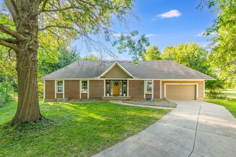 Front exterior of 7004 E 132nd St, Grandview, MO, a home sold by Carol Tran Reynolds